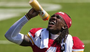 Kansas City Chiefs wide receiver Rashee Rice takes a drink during Back Together Weekend at the team's NFL football training camp, Sunday, July 27, 2025, in St. Joseph, Mo. (AP Photo/Charlie Riedel)