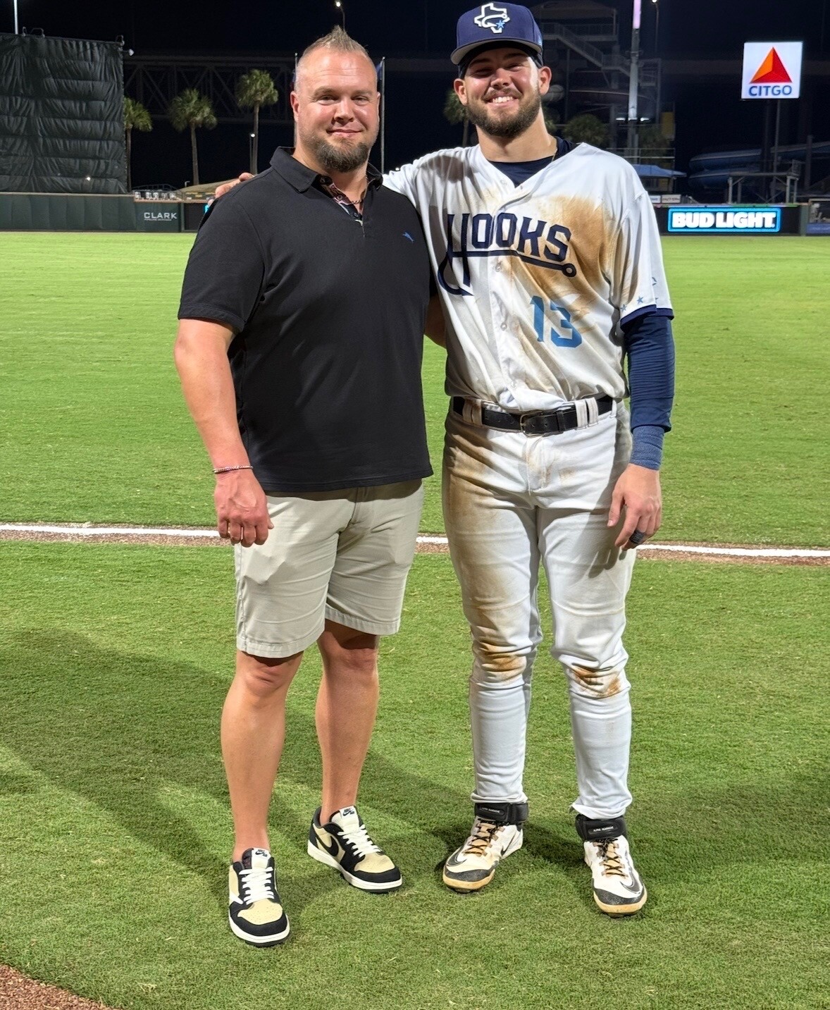 Hooks catcher Will Bush with his father