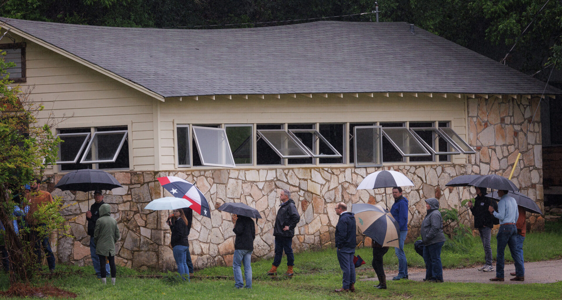 Texas state lawmakers serving on general investigating committees examining the July 2025 flooding walk the grounds of Camp Mystic during a site visit in Hunt, Texas, on Monday, April 20, 2026.