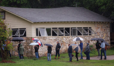 Texas state lawmakers serving on general investigating committees examining the July 2025 flooding walk the grounds of Camp Mystic during a site visit in Hunt, Texas, on Monday, April 20, 2026.