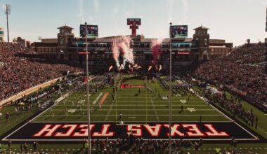 Raider Red shoots off his two shotguns at midfield prior to Texas Tech's 2025 home win over UCF.