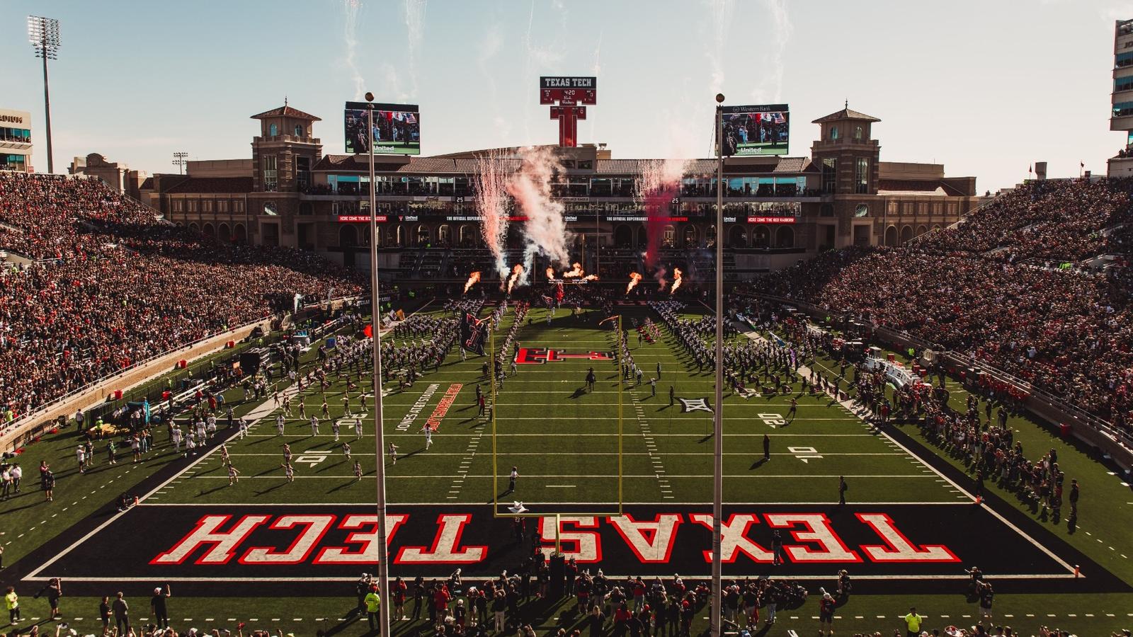 Raider Red shoots off his two shotguns at midfield prior to Texas Tech's 2025 home win over UCF.