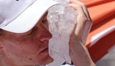 Jannik Sinner of Italy cools himself with the ice during the second round men's singles tennis match against Juan Manuel Cerundolo of Argentina at the French Open tennis tournament in Paris, Thursday, May 28, 2026. (AP Photo/Thibault Camus)