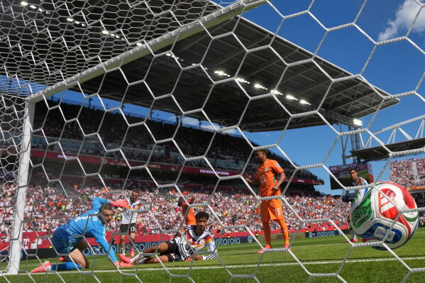 Ivory Coast's Franck Kessie (8) scores their opening goal during the World Cup Group E soccer match between Germany and Ivory Coast in Toronto, Canada, Saturday, June 20, 2026. (AP Photo/Stephanie Scarbrough)