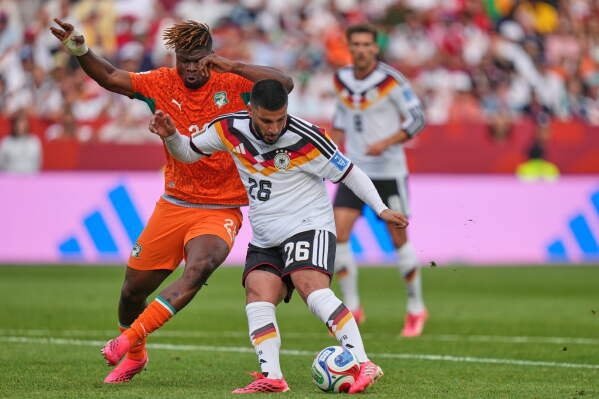 Germany's Deniz Undav scores their second goal during the World Cup Group E soccer match between Germany and Ivory Coast in Toronto, Saturday, June 20, 2026. (AP Photo/Stephanie Scarbrough)