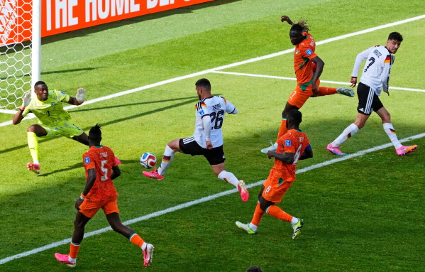 Germany's Deniz Undav (26) scores their first goal during the World Cup Group E soccer match between Germany and Ivory Coast in Toronto, Saturday, June 20, 2026. (Chris Young/The Canadian Press via AP)