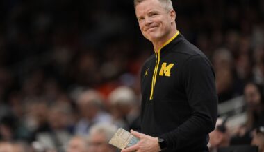 Michigan head coach Dusty May watches play against Auburn during the second half in the Sweet 16 of the NCAA college basketball tournament, Friday, March 28, 2025, in Atlanta. (AP Photo/George Walker IV)