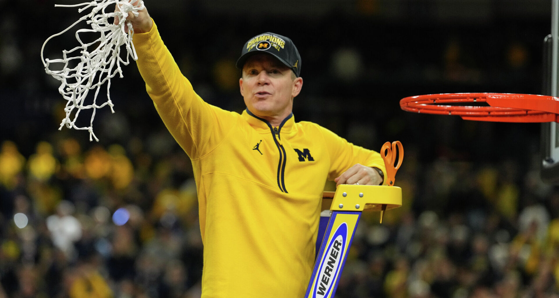 Michigan head coach Dusty May watches play against Auburn during the second half in the Sweet 16 of the NCAA college basketball tournament, Friday, March 28, 2025, in Atlanta. (AP Photo/George Walker IV)