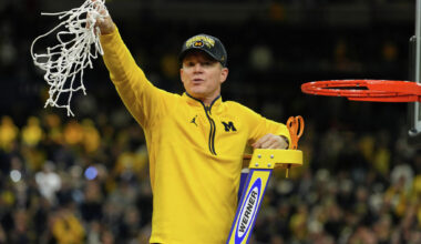 Michigan head coach Dusty May watches play against Auburn during the second half in the Sweet 16 of the NCAA college basketball tournament, Friday, March 28, 2025, in Atlanta. (AP Photo/George Walker IV)