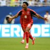 Cape Verde's midfielder Kevin Pina celebrates after scoring his team's first goal during a World Cup match against Uruguay in Miami Gardens, Fla., on Sunday. Cape Verde played Uruguay to a 2-2 draw.