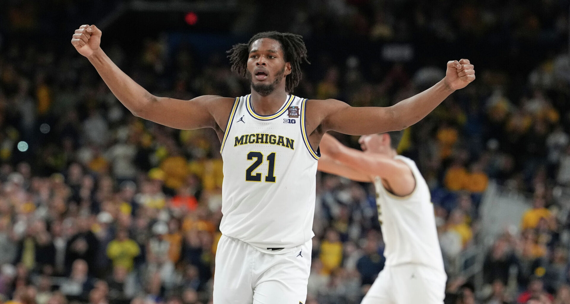 Michigan's Morez Johnson Jr. dunks during the second half in the Elite Eight of the NCAA college basketball tournament against Tennessee, Sunday, March 29, 2026, in Chicago. (AP Photo/Erin Hooley)