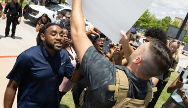 Pardoned U.S. Capitol rioter Jake Lang is confronted by a supporters of Karmelo Anthony outside of the Collin County Courthouse as Anthony’s murder trial is underway in McKinney, TX, Thursday, June 4, 2026. Anthony is accused of killing 17-year-old Austin Metcalf last April at a Frisco track meet at David Kuykendall Stadium.