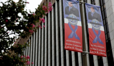 A banner honoring slain Dallas police officer Lorne Ahrens hangs near El Centro College in downtown Dallas on Sept. 26, 2016. Banners honoring the five police officers killed in the July 7 ambush line some of the downtown Dallas streets as a reminder of the officers' heroism. (Rose Baca/The Dallas Morning News)