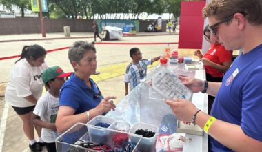 Fans wait in hours-long line for free bracelets at FIFA Fan Festival