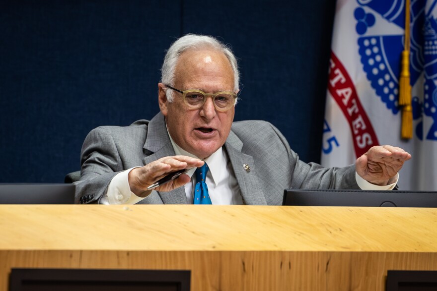 A picture of Austin Mayor Kirk Watson at a city council meeting.