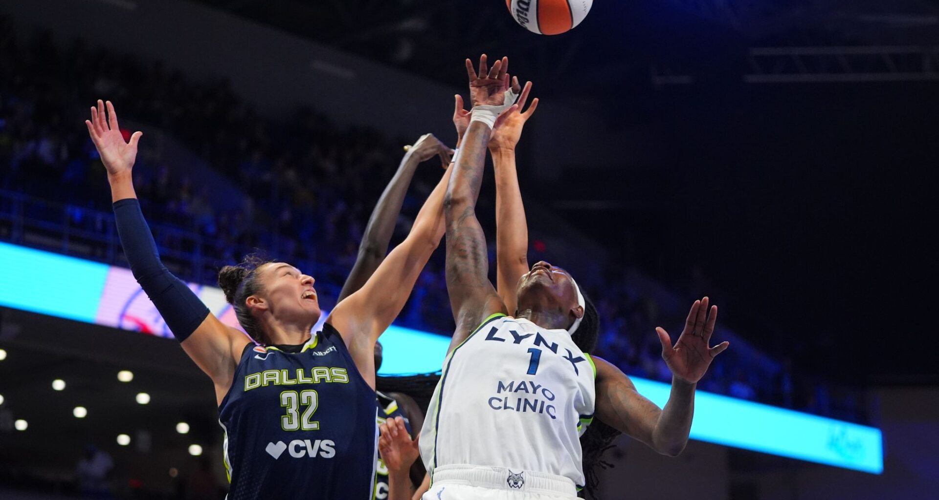 Howard and Miles score 21, Reeve ties WNBA coaching wins record as Lynx beat Wings 85-77