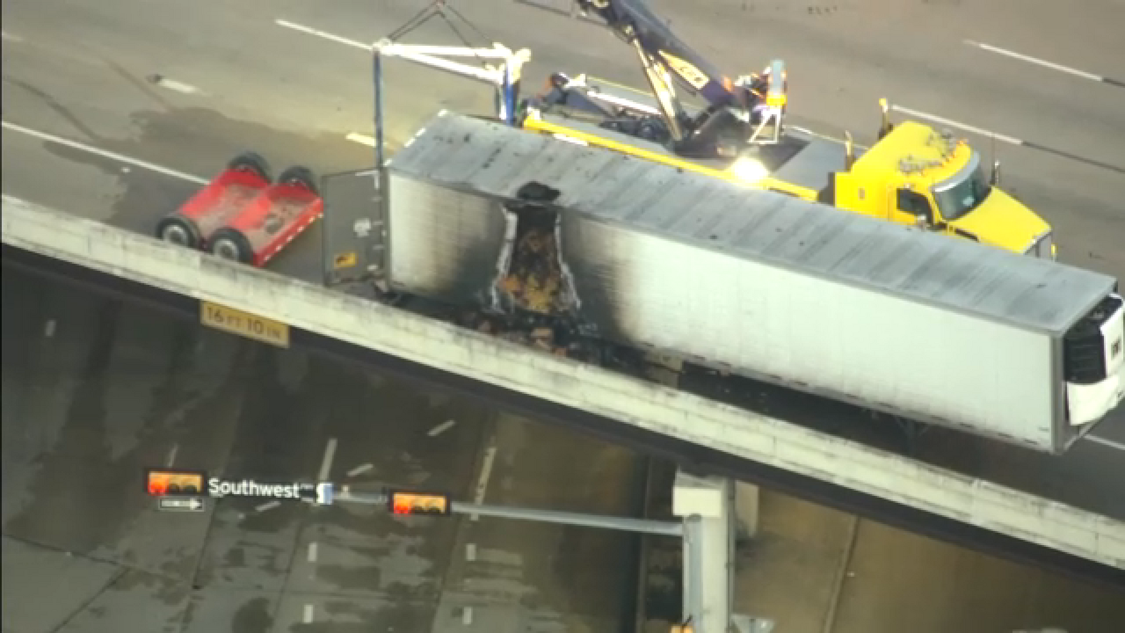 Lanes cleared after 18-wheeler hauling tomatoes catches fire along Southwest Freeway northbound at Bellaire: HPD