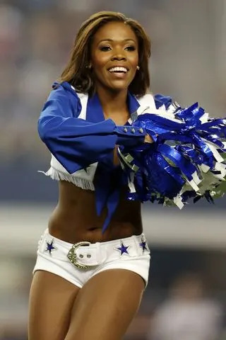 Dallas Cowboys Cheerleader Jasmine Goode performs on August 25, 2012, in Arlington, TexasCredit: Ronald Martinez/Getty