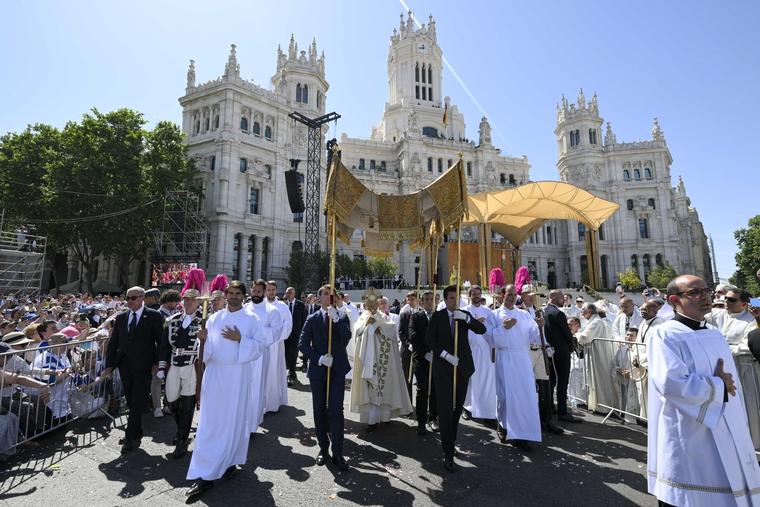 Pope Leo carries the Eucharist in Plaza de Cibeles in Madrid on Corpus Christi Sunday, June 7, 2026.