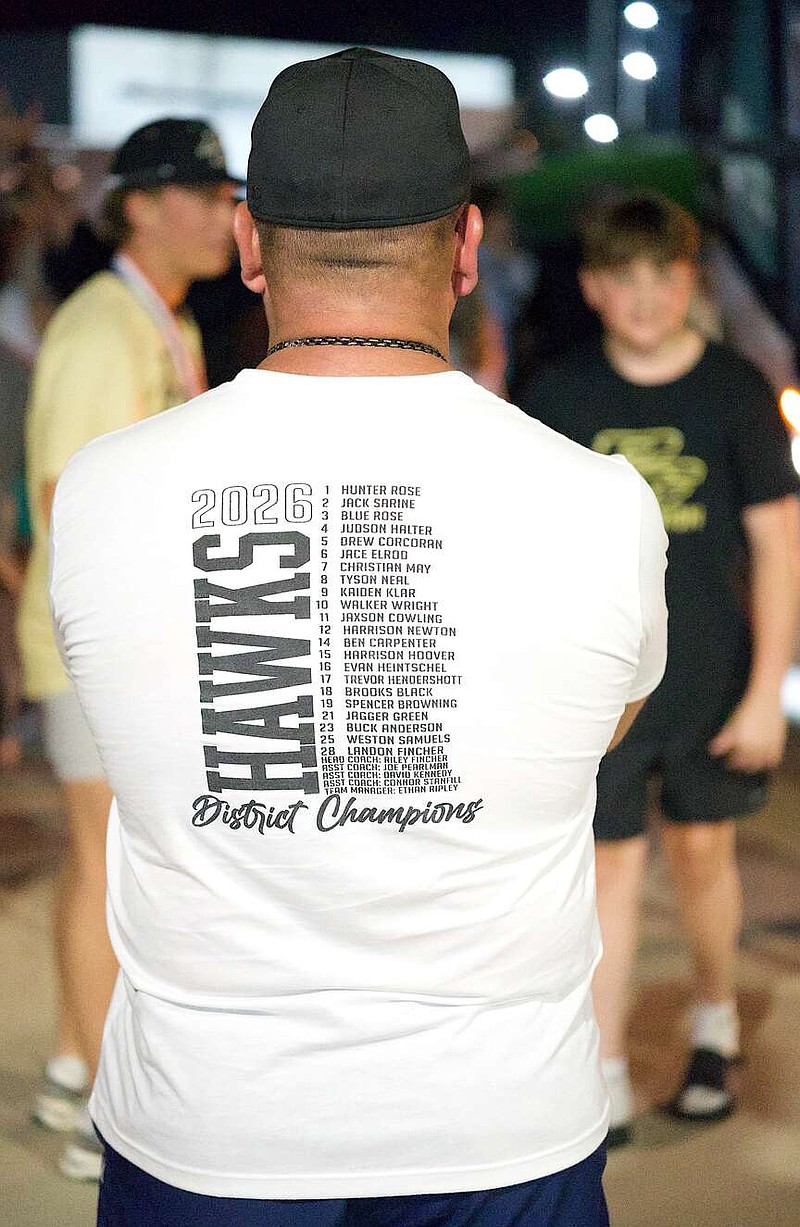 Kevin Samuels and scores of other Pleasant Grove supporters welcome the Hawks baseball team Friday, June 5, 2026, at the high school as the squad returns after clinching the Class 4A, Division 1 title. Samuels' son, Weston, wears No. 25 for Pleasant Grove. (Staff photo by Stevon Gamble)