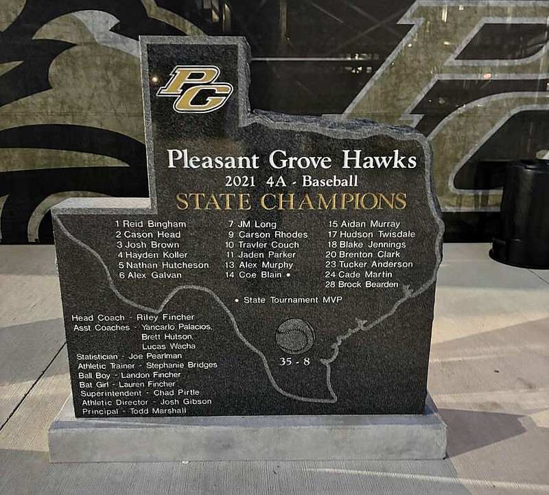 A marker seen Friday, June 5, 2026, outside the Pleasant Grove High School baseball field commemorates the Hawks' 2021 state championship. The Hawks won the school's fourth state title earlier Friday in a 2-1 victory over Corpus Christi Calallen. (Staff photo by Stevon Gamble)