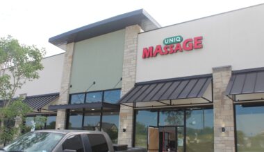 Image of Uniq Massage sign above entrance.