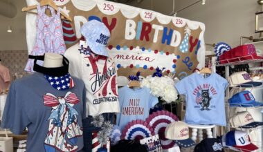 The Drip Swag Shop team created several display tables, including one for Independence Day. (Sierra Martin/Community Impact)