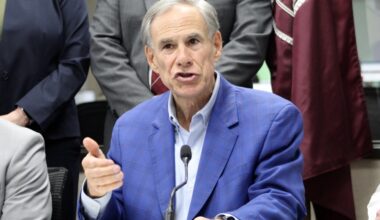Gov. Greg Abbott, wearing a blue jacket and shirt, speaks to press June 5.