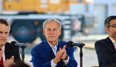 Gov. Greg Abbott, center, is seated next to two other men at a Nov. 14 event at the Midlothian Google Data Center.