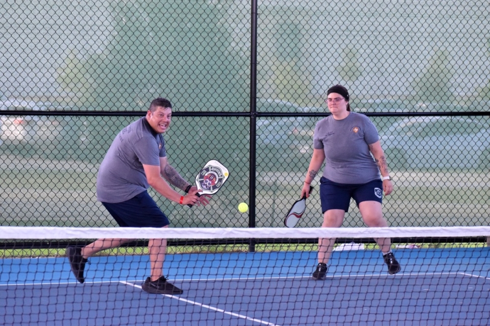 Firefighters playing pickleball