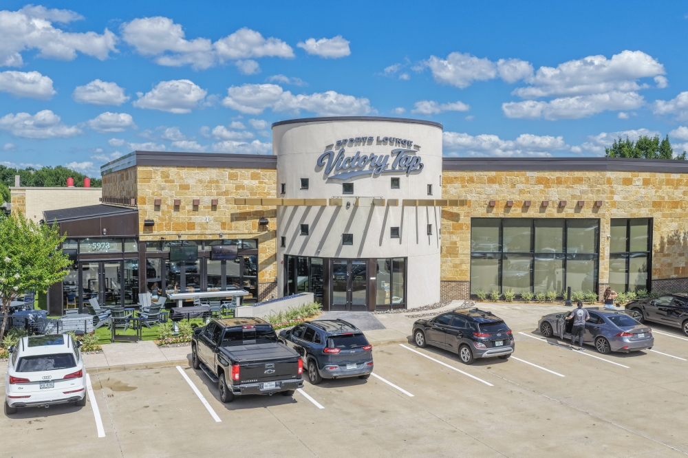 The Victory Tap sports lounge opened at West Plano Village, a mixed-use development near Parker Road and Dallas North Tollway. (Courtesy Weitzman Management Corporation)