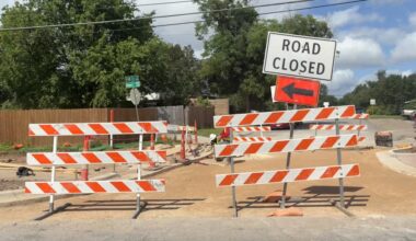 Construction barricades block a road near the intersection of 14th 1/2 Street and Airport Boulevard in East Austin on June 11. (Jessica McLaren/Community Impact)