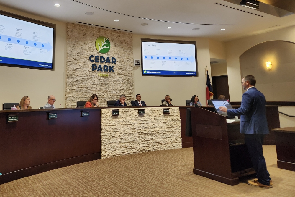 Randy Lueders, director of engineering and capital projects for the city of Cedar Park, discusses a planned shared-use path along Buttercup Creek Boulevard with City Council members at the June 11 meeting. (Daniel Schwalm/Community Impact)