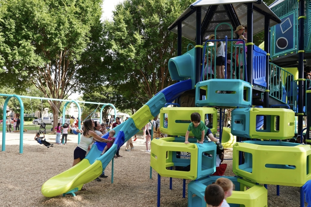 children playing on a colorful playground