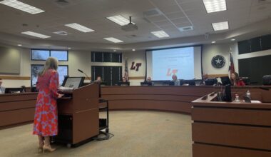 Lake Travis ISD officials conducted a public hearing to present the fiscal year 2026-27 budget and proposed tax rate at a June 17 meeting. (Sienna Wight/Community Impact)