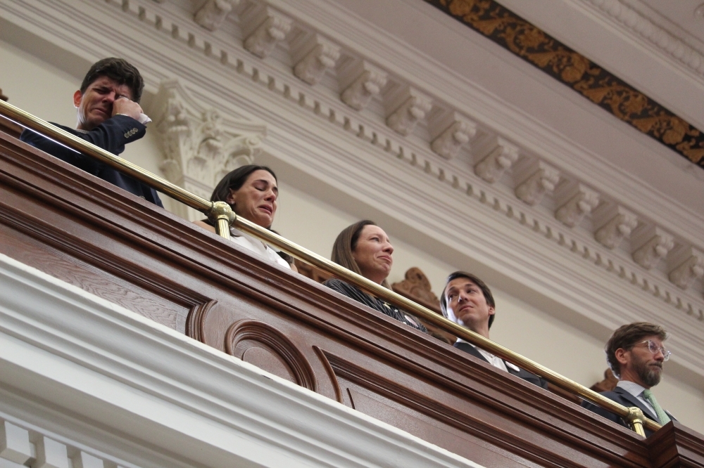 Family members of the victims of the July 4 flooding at Camp Mystic shed tears as Texas House lawmakers prepare to vote on legislation to increase flood safety at youth camps Aug. 21, 2025. (Community Impact staff)