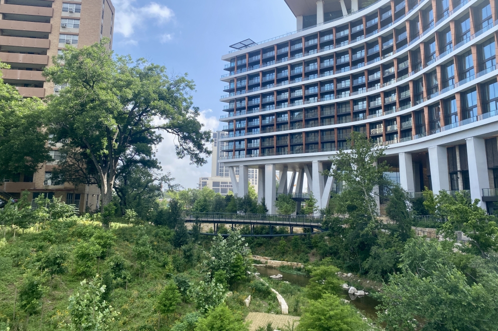 The Confluence reaches 13 acres of space along Waller Creek, according to a release. (Katlynn Fox/Community Impact)