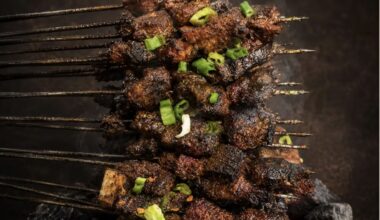 The smokehouse’s menu has a variety of meat skewers like sliced beef, pork belly, lamb and chicken wings. (Courtesy Yang's Smokehouse)