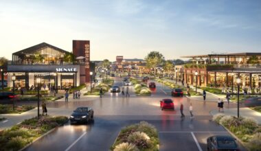 Rendering of the Azalea District with roads, cars, trees and buildings