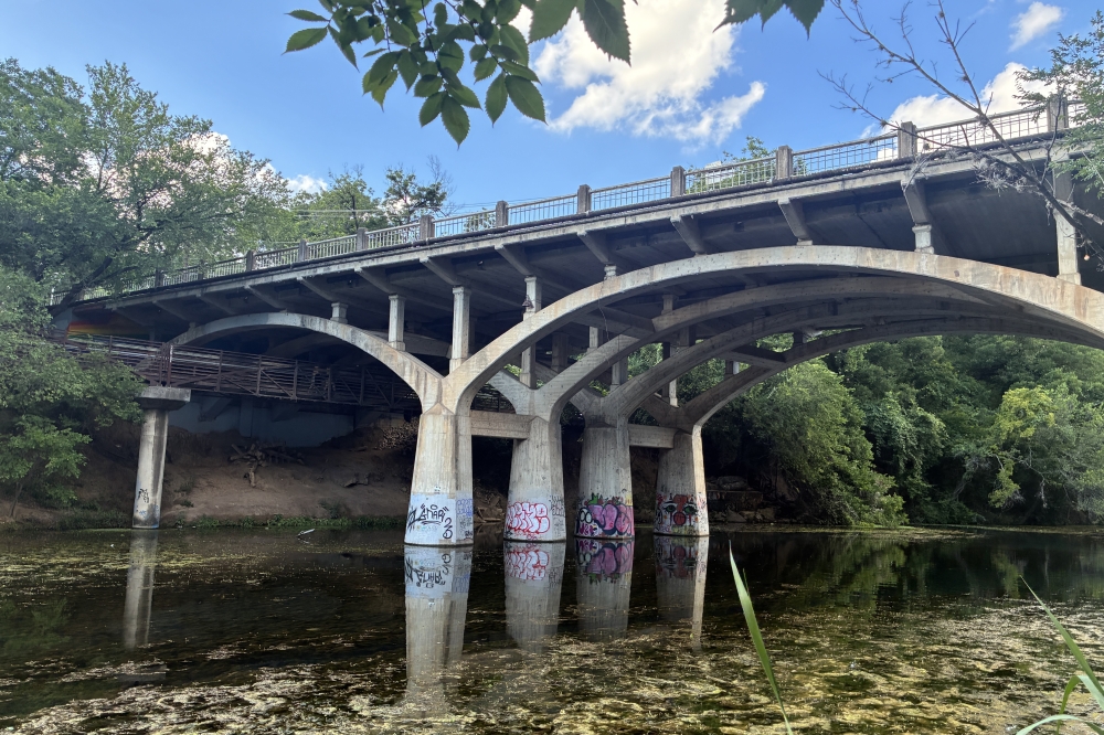 The Barton Springs Road Bridge spans Barton Creek near Zilker Park in Austin, Texas. The now 100-year-old 1926 concrete arch structure is slated for replacement by the city of Austin. (Jessica McLaren/Community Impact)