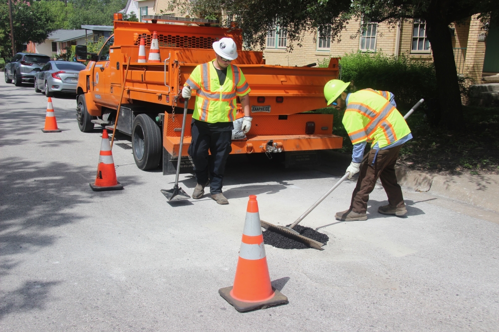 Waymo with pothole