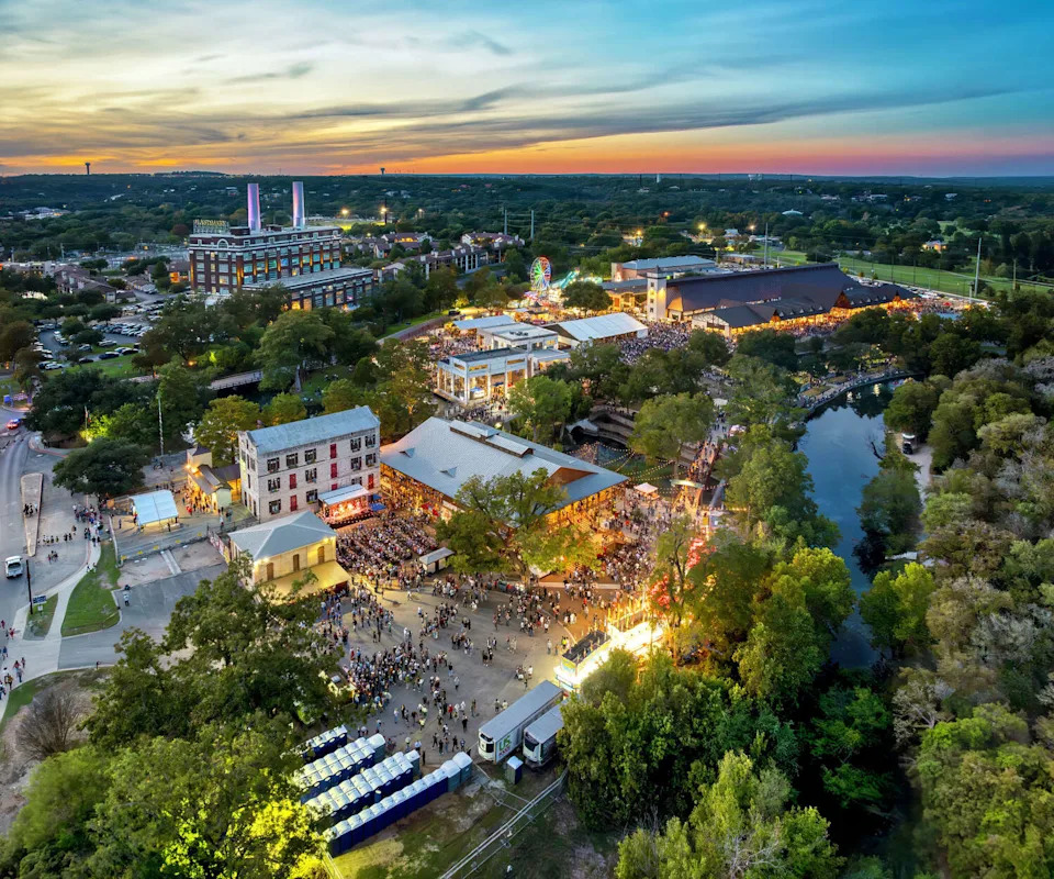 A drone captures an overhead shot of the 2024 annual Wurstfest celebrations hosted in New Braunfels, Texas (Courtesy of FlyBy Photography)