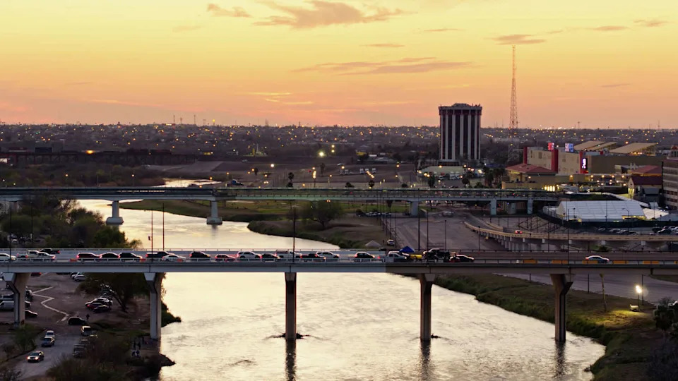 The Rio Grande river at Laredo is under a flood warning through Thursday, June 18, 2026, due to heavy rainfall that is expected to cause the river to crest. Aerial view of Laredo, Texas at sunset over looking the Rio Grande River. Authorization was obtained from the FAA for this operation in restricted airspace. (halbergman/Getty Images/iStockphoto)