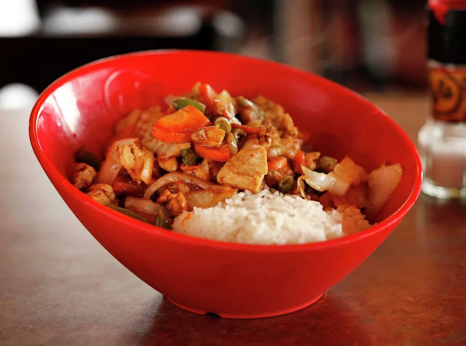 Chicken Teriyaki Bowl with white rice at Genghis Grill. (Evans Caglage/Dallas Morning News)