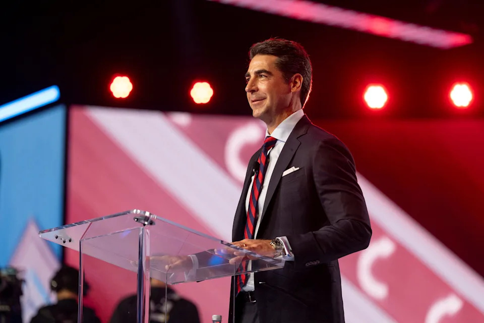 Fox News anchor Jesse Watters speaks during AmericaFest in Phoenix on Dec. 20, 2025.