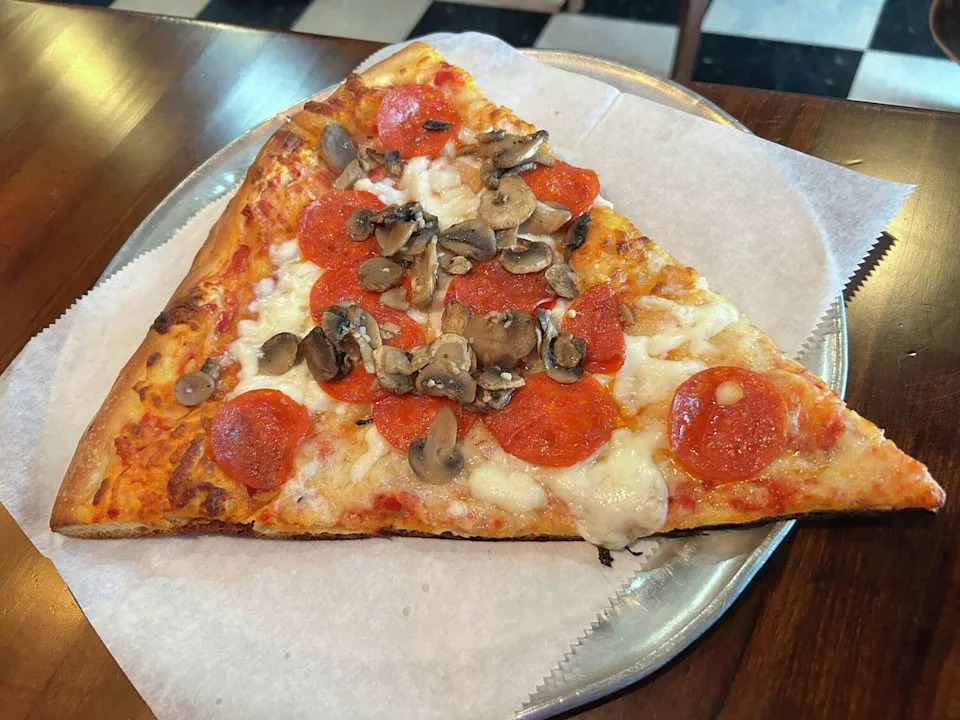 A slice of pizza from Julian's Italian Pizzeria. (Polly Anna Rocha/MySA)