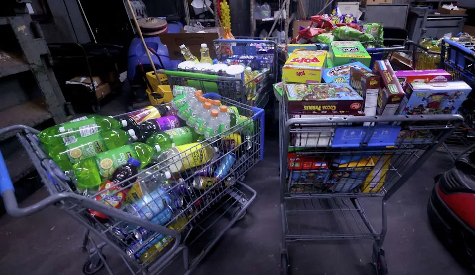 Grocery carts in the stock area on the dock are filled with shelf items to be transported to another facility following the announcement that the Cash Saver grocery store located on Ledbetter Drive was closing permanently this week. Photos of Cash Saver, one of the few grocery stores serving east Oak Cliff, were taken at 2130 E. Ledbetter Drive in Dallas on June 10, 2026. (Steve Hamm/The Dallas Morning News)