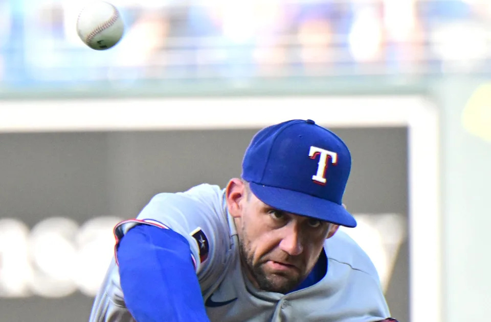 KANSAS CITY, MO - JUNE 09: <a class="link " href="https://sports.yahoo.com/mlb/teams/texas/" data-i13n="sec:content-canvas;subsec:anchor_text;elm:context_link" data-ylk="slk:Texas Rangers;sec:content-canvas;subsec:anchor_text;elm:context_link;itc:0" data-yga="{"yLinkElement":"context_link","yModuleName":"content-canvas","yLinkText":"Texas Rangers","ySubModuleName":"anchor_text","yHasCommerce":false}">Texas Rangers</a> starting pitcher <a class="link " href="https://sports.yahoo.com/mlb/players/9007/" data-i13n="sec:content-canvas;subsec:anchor_text;elm:context_link" data-ylk="slk:Nathan Eovaldi;sec:content-canvas;subsec:anchor_text;elm:context_link;itc:0" data-yga="{"yLinkElement":"context_link","yModuleName":"content-canvas","yLinkText":"Nathan Eovaldi","ySubModuleName":"anchor_text","yHasCommerce":false}">Nathan Eovaldi</a> (17) throws a warm up pitch before a MLB game between the Texas Rangers and <a class="link " href="https://sports.yahoo.com/mlb/teams/kansas-city/" data-i13n="sec:content-canvas;subsec:anchor_text;elm:context_link" data-ylk="slk:the Kansas City Royals;sec:content-canvas;subsec:anchor_text;elm:context_link;itc:0" data-yga="{"yLinkElement":"context_link","yModuleName":"content-canvas","yLinkText":"the Kansas City Royals","ySubModuleName":"anchor_text","yHasCommerce":false}">the Kansas City Royals</a> on June 09, 2026, at Kauffman Stadium in Kansas City, MO. (Photo by Keith Gillett/Icon Sportswire via Getty Images) | Icon Sportswire via Getty Images