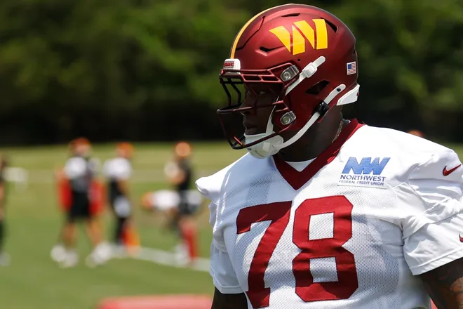 Jun 10, 2025; Ashburn, VA, USA; Washington Commanders offensive tackle Laremy Tunsil (78) stands on the field on day one of minicamp at Commanders Park. Mandatory Credit: Geoff Burke-Imagn Images
