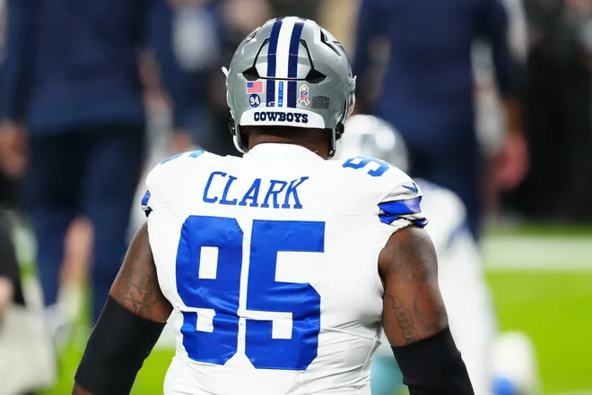 Nov 17, 2025; Paradise, Nevada, USA; Dallas Cowboys defensive tackle Kenny Clark (95) warms up prior to a game against the Las Vegas Raiders at Allegiant Stadium. The Cowboys will wear “94” decals on their helmets to honor teammate Marshawn Kneeland who tragically passed on November 6th. Mandatory Credit: Stephen R. Sylvanie-Imagn Images